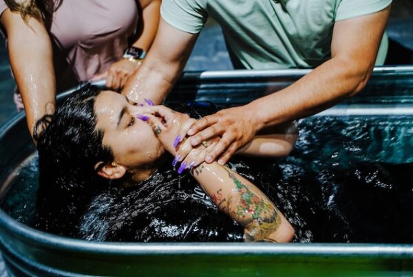 Girl being baptised in water