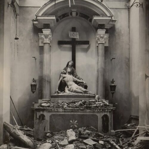 Picture of Jesus taken dow from the cross in a dilapidated room.