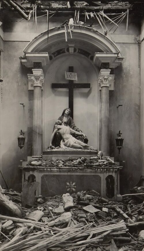 Picture of Jesus taken dow from the cross in a dilapidated room.