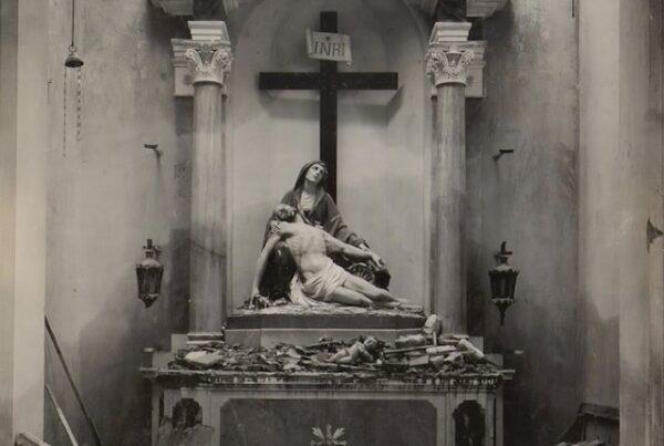 Picture of Jesus taken dow from the cross in a dilapidated room.