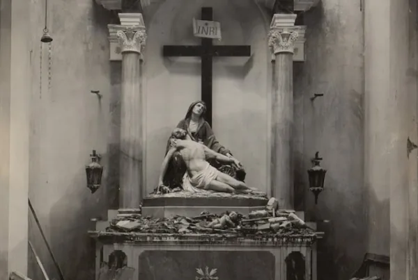 Picture of Jesus taken dow from the cross in a dilapidated room.