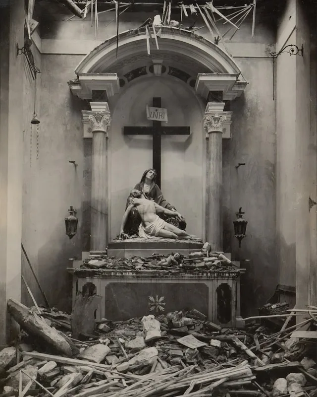 Picture of Jesus taken dow from the cross in a dilapidated room.